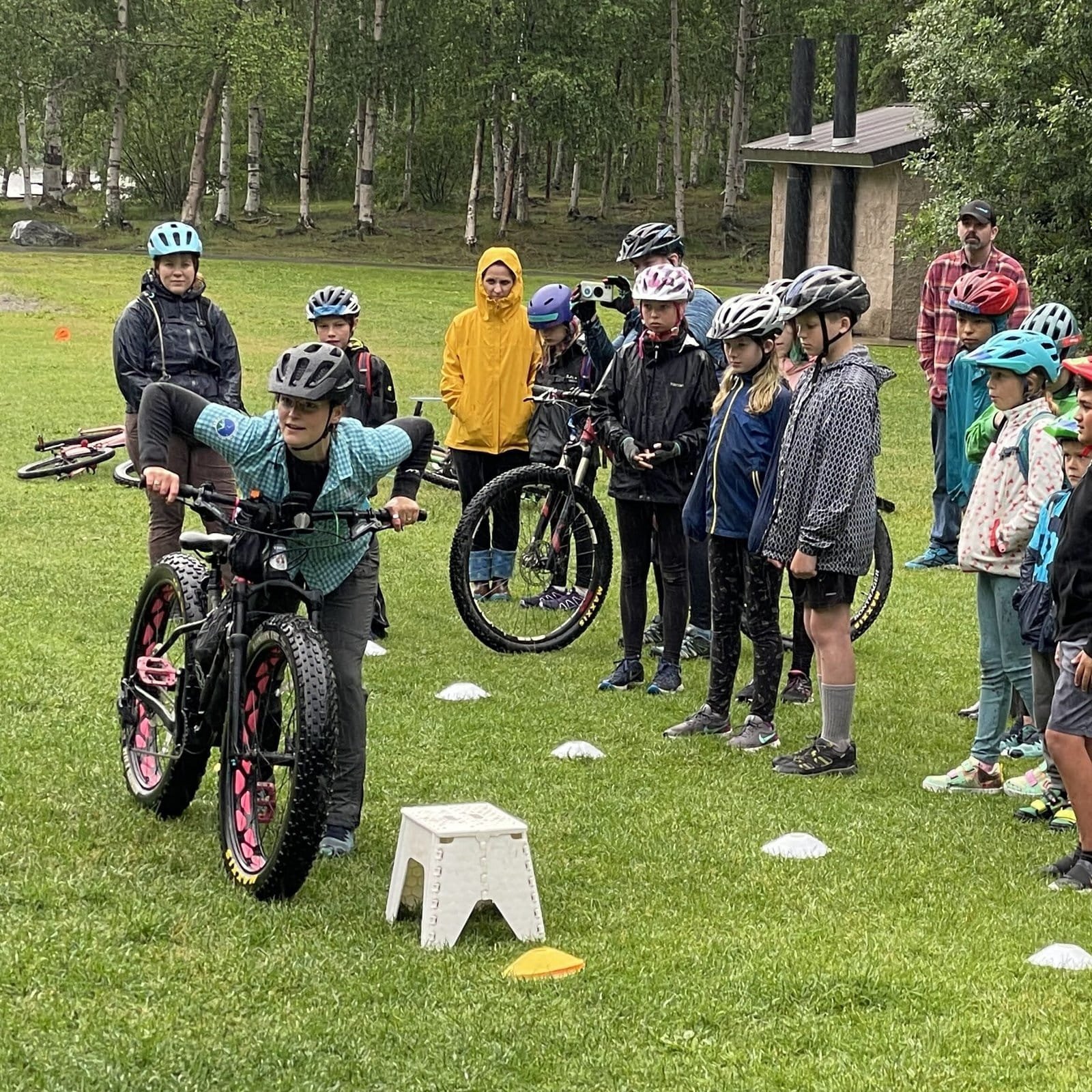 MTB coach teaching youth